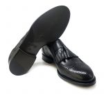 Black leather brogue tassel loafers by Fragiacomo