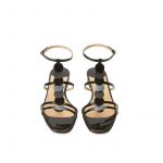 Black patent leather sandals with ankle strap and leather and suede discs, SS19 collection by Fragiacomo, over view