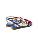 Blue patent leather flat sandals with ankle strap and multicolor bow, SS19 collection by Fragiacomo, back view