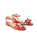 Coral red patent leather flat sandals with ankle strap and multicolor bow, SS19 collection by Fragiacomo, side view