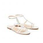 White patent leather sandals with ankle strap and leather and suede discs, SS19 collection by Fragiacomo, side view