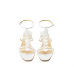 White patent leather sandals with ankle strap and leather and suede discs, SS19 collection by Fragiacomo, over view
