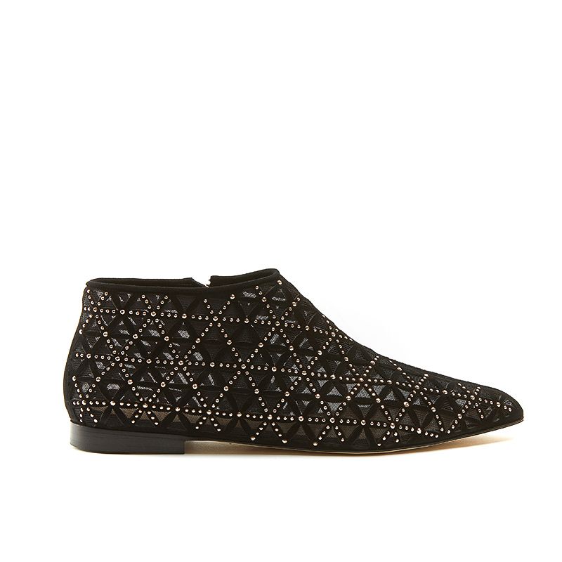 Black suede flat ankle boots with iconic laser cut pattern and small gold studs