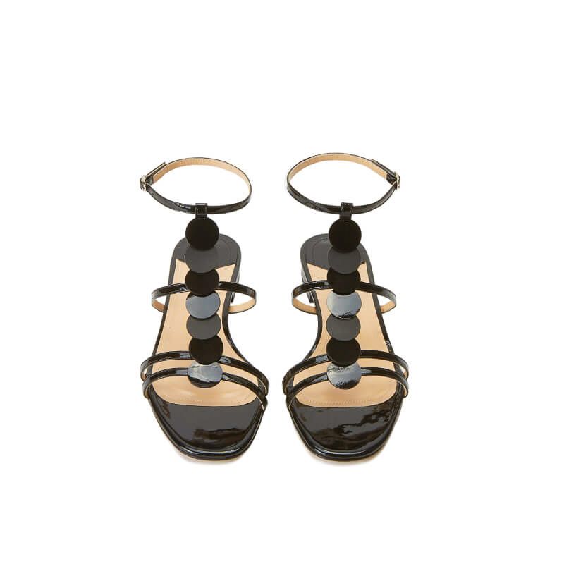 Black patent leather sandals with ankle strap and leather and suede discs, SS19 collection by Fragiacomo, over view