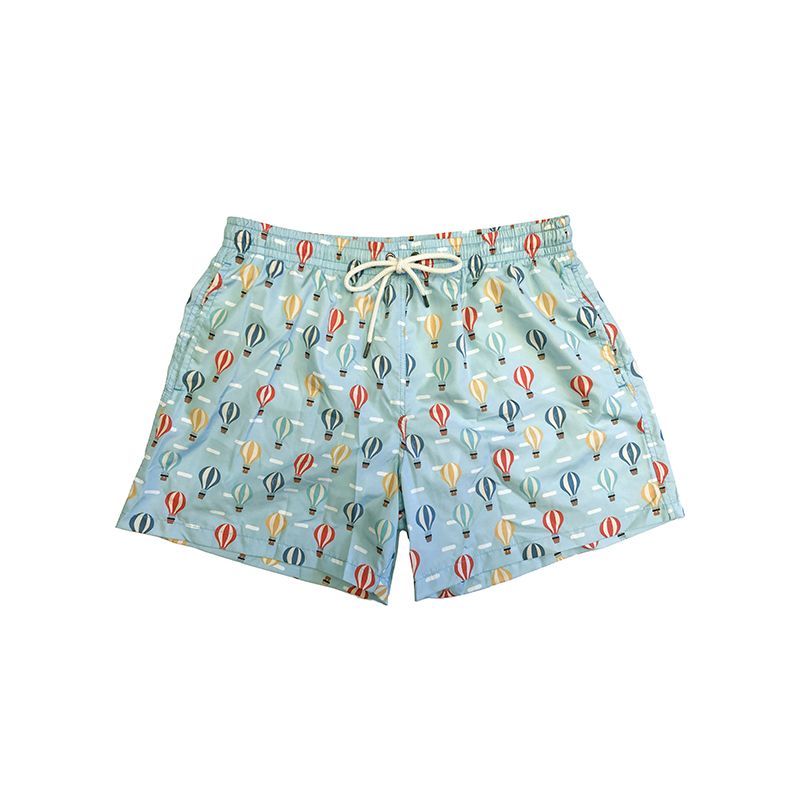 Mint green men’s swim shorts in light fabric with balloon pattern made in Italy by Fragiacomo
