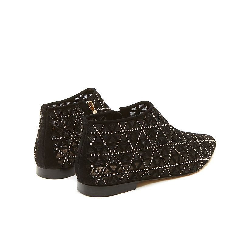 Tronchetti neri in camoscio con iconico pattern laserato, piccole borchie dorate e tacco basso, da donna by Fragiacomo